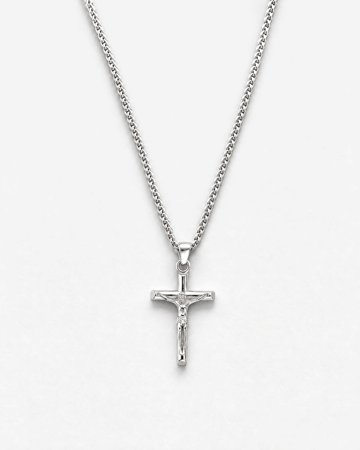 Jesus Cross (Silver) pendant laid flat, close up