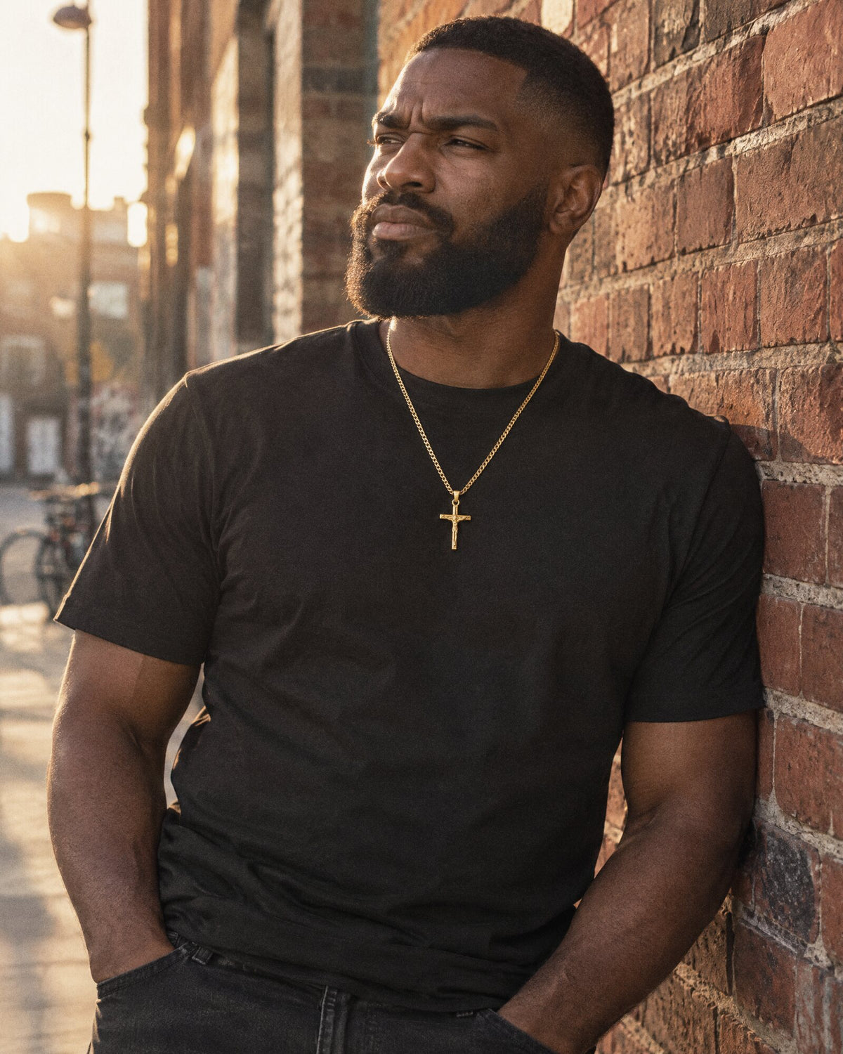 Man wearing the Jesus Cross (Gold) pendant