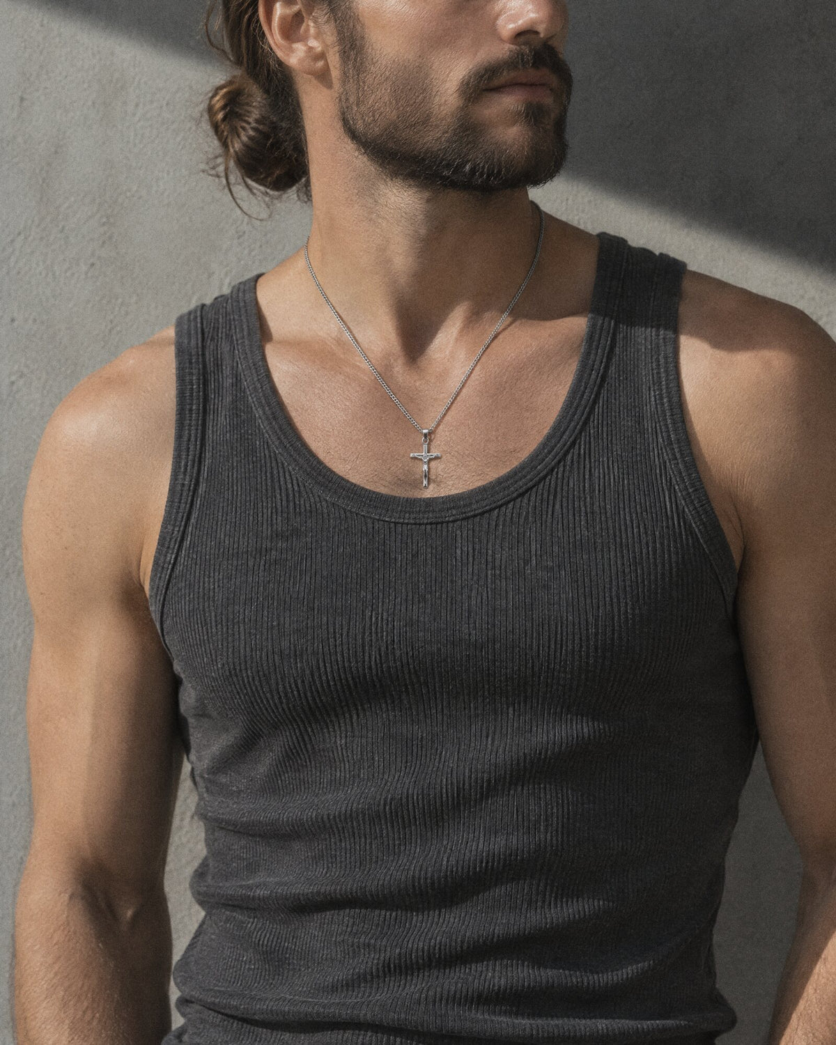 Man wearing the Jesus Cross (Silver) pendant